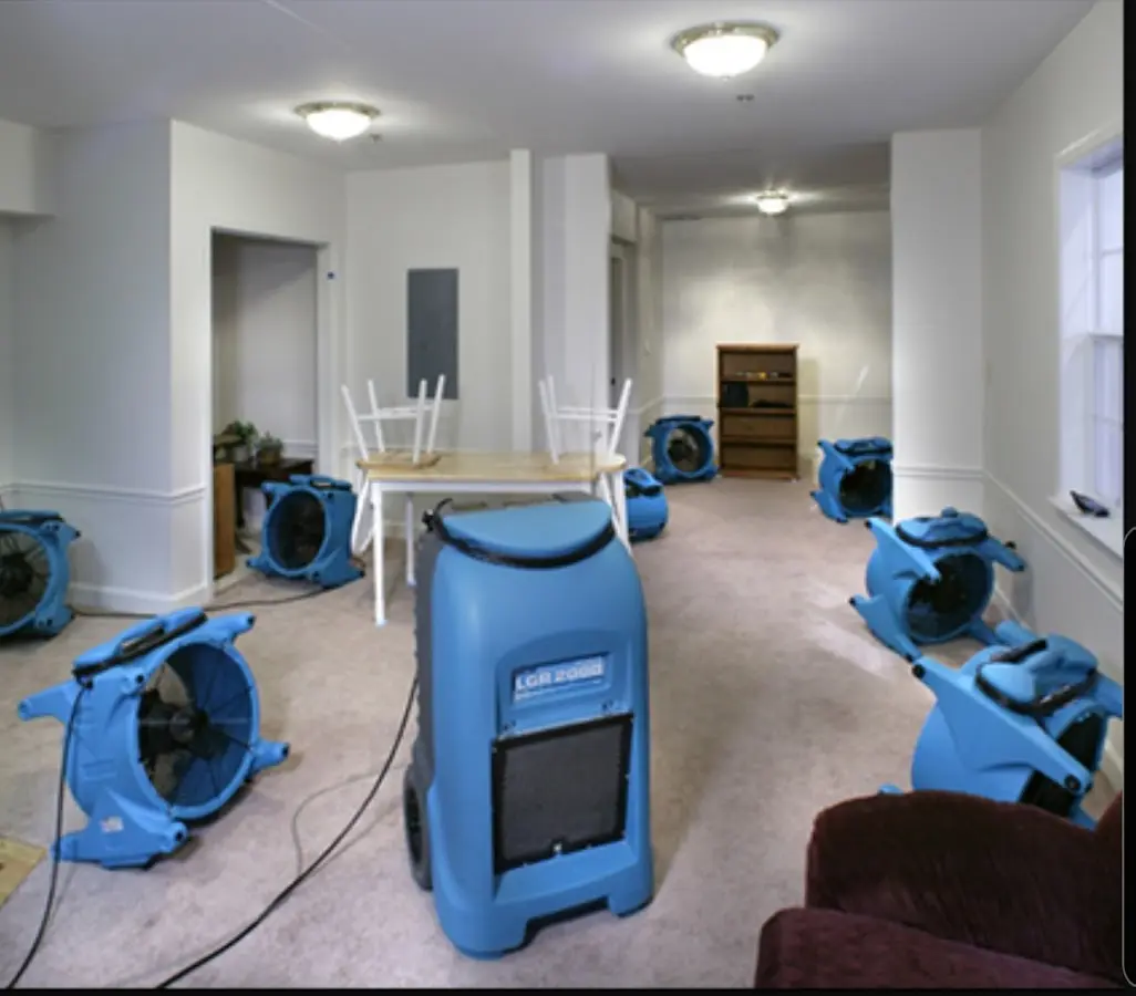 Air movers and dehumidifier setup for Water Damage Restoration in Muleshoe